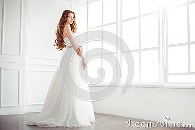 Happy bride indoors Stock Photo