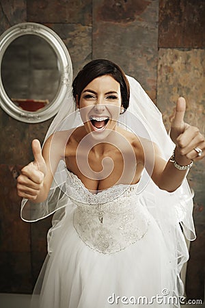 Happy bride thumbs up Stock Photo