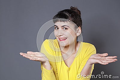 Happy brunette girl expressing careless responsibility Stock Photo