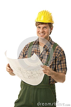 Happy builder holding floor plan Stock Photo