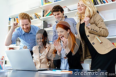 Happy business coworkers celebrating Stock Photo