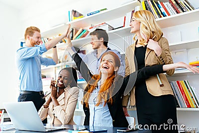 Happy business coworkers celebrating Stock Photo