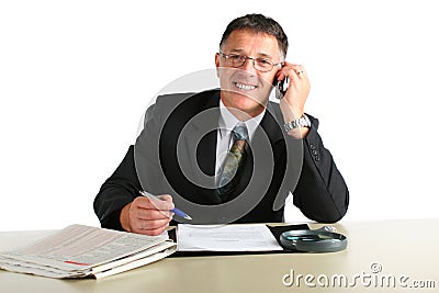 Happy business man busy on a phone, signing a contract and reading financial news Stock Photo