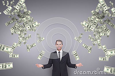 Happy business man with money rain against purple background Stock Photo