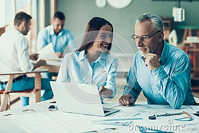 Happy Business People Working Together in Office Stock Photo