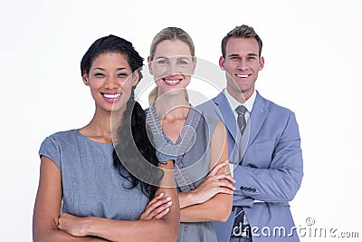 Happy business team smiling at camera Stock Photo