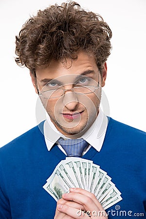 Happy businessman in glasses holding money Stock Photo