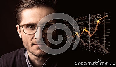 Happy businessman with a growing graph Stock Photo