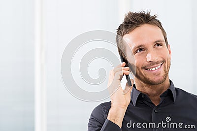 Happy Businessman On Mobile Phone Stock Photo