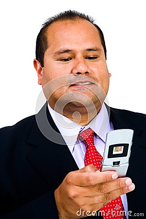 Happy businessman text messaging Stock Photo