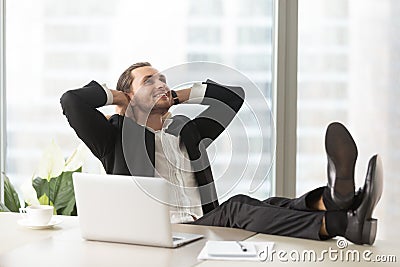 Happy businessman thinking about good perspectives Stock Photo