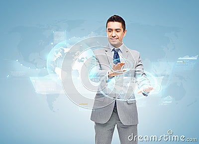 Happy businessman working with virtual screens Stock Photo