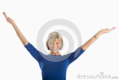Happy Businesswoman With Arms Raised Against White Background Stock Photo