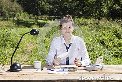 Happy businesswoman holds a bribe Stock Photo