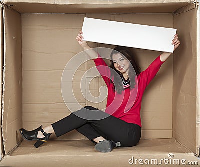 Happy businesswoman holds a copy space Stock Photo