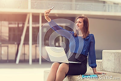 Happy businesswoman take a selfie Stock Photo