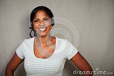 Happy callcenter operator looking at the camera Stock Photo