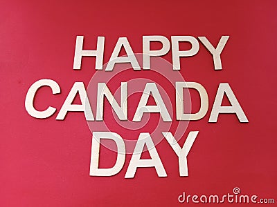 Happy Canada day sign on a red background Stock Photo