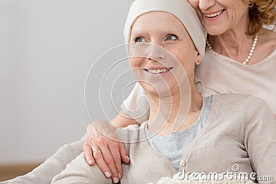 Cancer survivor lying in embrace Stock Photo