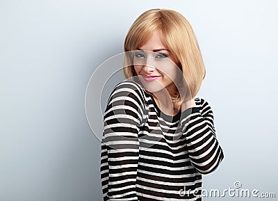 Happy casual blond woman with short hairstyle looking with smile Stock Photo