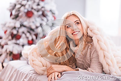 Happy charming woman waiting for Christmas Stock Photo
