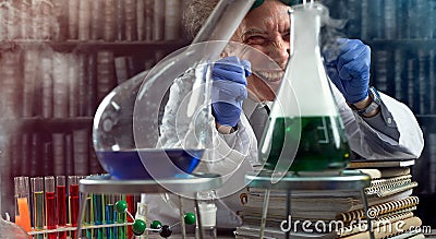 Happy chemist laughing experiment succeeded Stock Photo