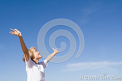 Happy child arms raised Stock Photo