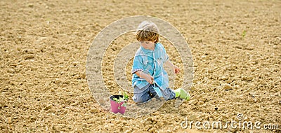 Happy child gardener. botanic worker. Spring season. ecology life. eco farm. human and nature. earth day. new life Stock Photo