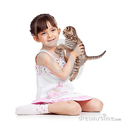 Happy child girl holding kitten isolated Stock Photo