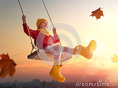 Girl on swing Stock Photo