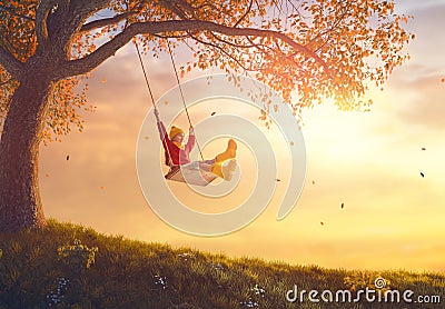 Girl on swing Stock Photo