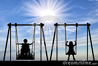 Happy child is handicapped in a wheelchair on an adaptive swing having fun with a healthy child together Stock Photo