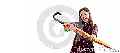 happy child hold colorful parasol. kid with rainbow umbrella isolated on white. Child with autumn umbrella, rainy Stock Photo