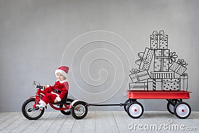 Kid having fun on Christmas time Stock Photo