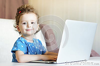 Little girl is studying remotely. online training. children and internet. Distance learning online education. Stock Photo