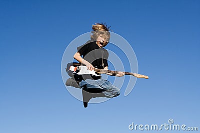 Happy child playing guitar Stock Photo