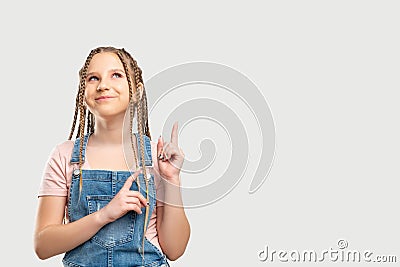 Happy child portrait girl pointing empty space Stock Photo