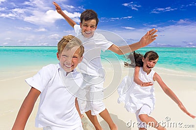 Happy children on beach Stock Photo