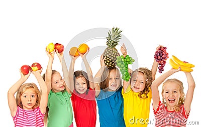 Happy children with fruits Stock Photo