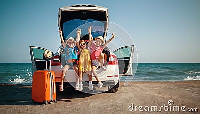 Happy children girls friends sisters on the car ride to summer trip Stock Photo