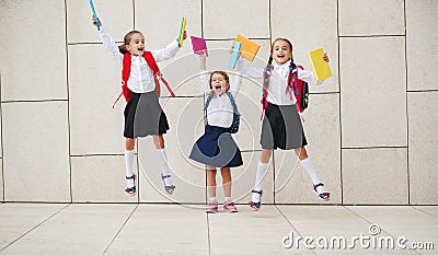 Happy children girlfriend schoolgirl student elementary school Stock Photo