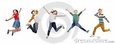 Happy children jumping over white background Stock Photo