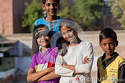 Happy children possing together on the street Editorial Stock Photo