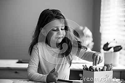 Happy children smiling and laughing in the classroom, successful pupils. Cute schoolgirl on lesson. Stock Photo