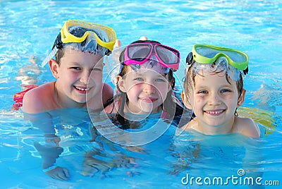 Happy children swimming Stock Photo