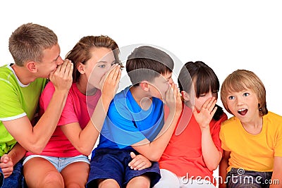 Happy children whispering Stock Photo