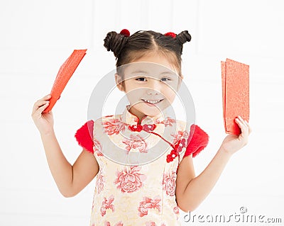 Chinese new year. little girls holding red envelope Stock Photo