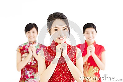 Happy chinese new year.woman with congratulation gesture Stock Photo