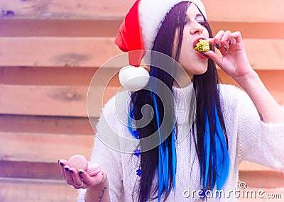 Happy Christmas holidays, girl eat sweets Stock Photo