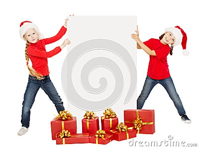 Happy Christmas kids holding banner. Santa helpers with poster Stock Photo